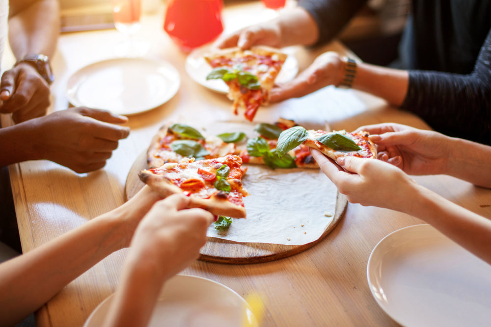 Celebrate National Pizza Party Day with These 4 Regional Pizza Styles